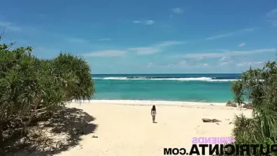 Putri Cinta nakedly strolled along the sandy beach